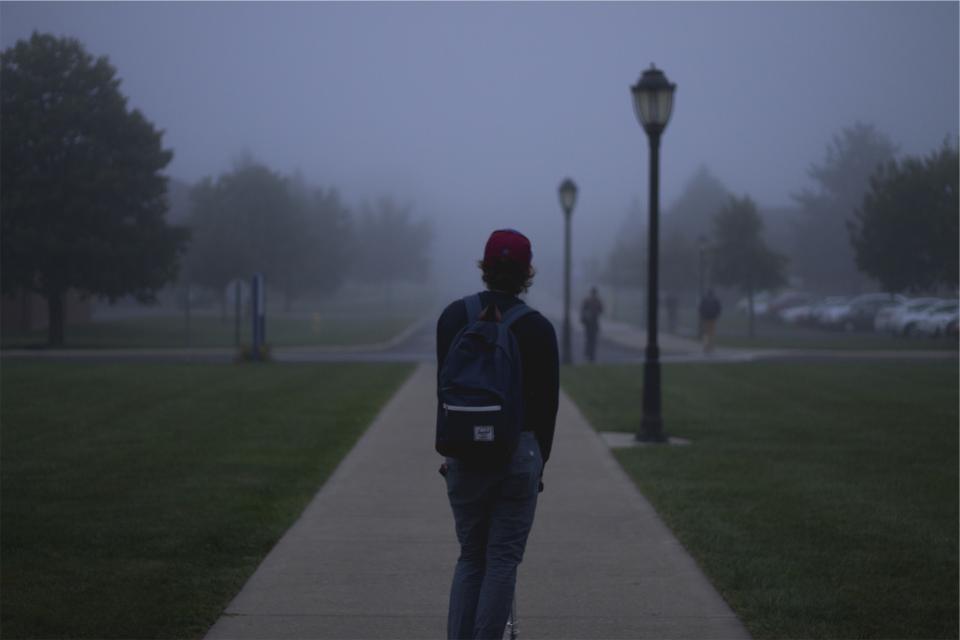 Two students walking on campus